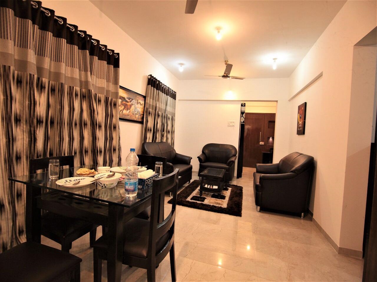 long stay service apartment in Pune with kitchen and living room